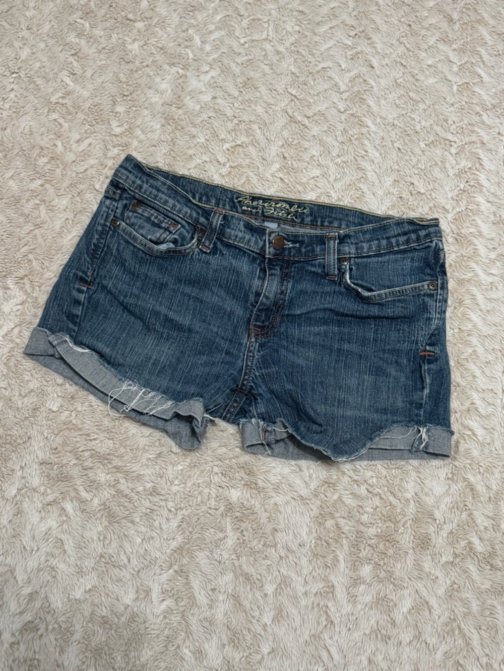 Vintage Abercrombie and Fitch navy denim shorts with patterned pockets